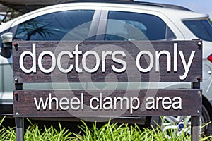 Sign Doctors Only Wheel Clamp Hospital