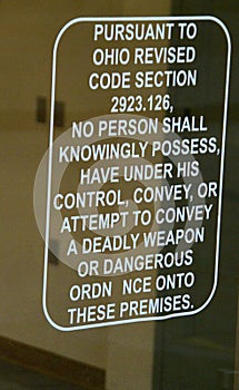 Sign on door of a train station in Ohio