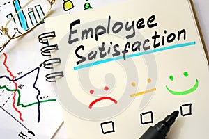 Sign employee satisfaction on a page. photo