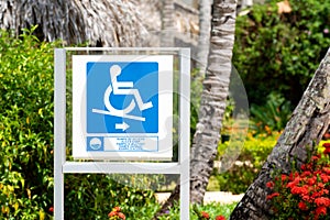 The sign exit road ramp for the disabled in a wheelchair. Caring for people with disabilities in the hotel