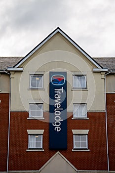 The sign on the exterior of a Travelodge hotel