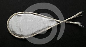 the sign of a fish, a piece of string and salt