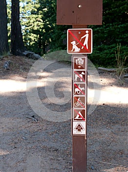 Sign forbidding dogs, biking, riding, tenting on trail