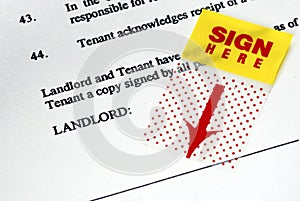 The sign-here sticker on the rental contract