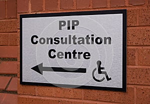 Sign indicating PIP consultation centre wheelchair entrance Birkenhead Wirral January 2020