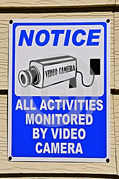 Sign indicating premises covered by a video camera