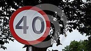 A sign informing about the speed limit to 40 kilometers per hour. photo