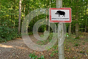 Sign with the inscription Afrikanische Schweinepest African swine fever.