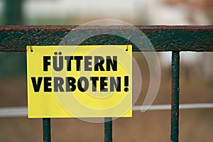 Sign with the inscription Feeding Prohibited Fuettern verboten