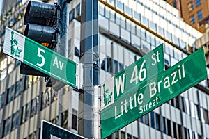 The sign at the intersection of Fifth Avenue and Little Brazil Street, located in the heart of Manhattan, in the heart of the Big