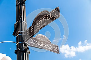 Sign at the intersection of West 8th Street and Congress Avenue