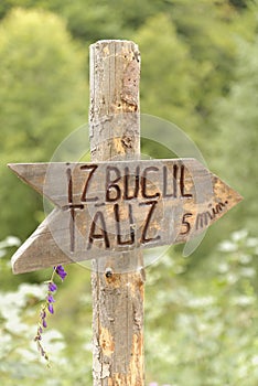 Sign for Izbucul Tauz Lake, Apuseni Mountains, Romania
