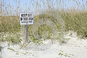 Sign Keep out in dunes at the beach