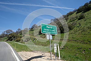 Sign for Kern County California along Highway 58 on a sunny day