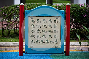 sign language guide at a playground