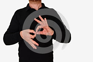 Sign language interpreter man translating a meeting to ASL, American Sign Language. Empty copy space