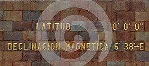 Sign of Latitude 0 at Middle of the world Monument in Quito photo