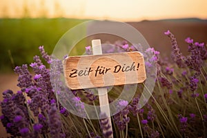 Sign in a lavender field with german text: Zeit für Dich! - Generative AI