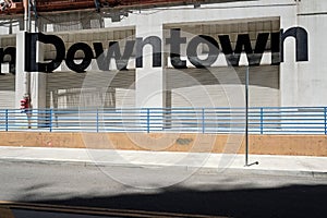 Sign letters DOWNTOWN at the entrance of Row DTLA in Los Angeles, California