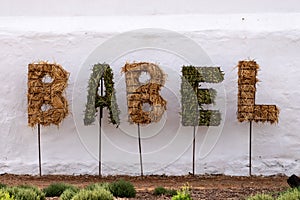 Sign made of dried grasses at Babylonstoren Wine Estate, Franschhoek, South Africa