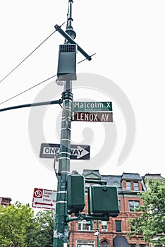 Sign of Malcolm X Boulevard in Harlem in New York City, USA