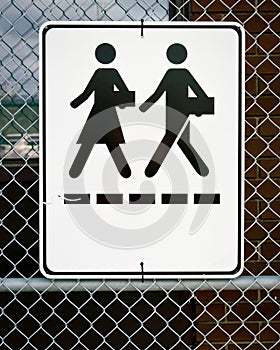 Sign - Man and Woman Walking with Briefcases