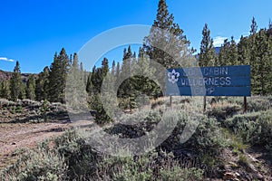 A sign marking the Boy Scouts' Log Cabin Wilderness Camp site