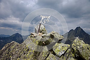 Sign with the name of the hill at the top of the Tupa hill in High Tatras, Slovakia