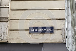 A sign with the name of the Seidlgasse street on the facade of a house in Vienna