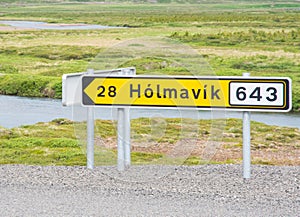 Sign near the road pointing towards village of Nordurfjordur in Icleand