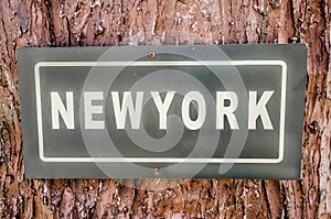Sign of newyork text plate photo