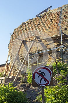 Sign ``No trespassing`` near restoration work