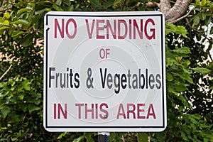 Sign no vending of fruits vegetables in this area in Dangriga town, Beli