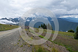 Sign for Obstruction Point Road in Olympic National Park, as seen from Hurricane Ridge. Not suitable for trailers and RVs