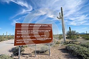 Sign at Organ Pipe National Monument, near the US and Mexico border, warns visitors to be aware of drug cartels and illegal