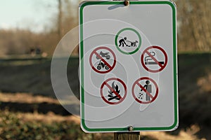 A sign outlining the rules of the trail photo