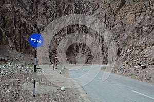 Sign panels on the mountain road in Leh, India