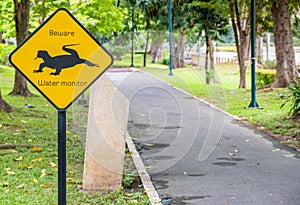 Sign in a park warning of water monitor lizards