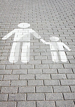 Sign pedestrian crossing painted on the road, safety of children