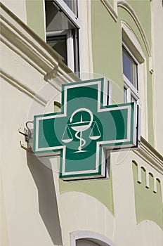 Sign of a Pharmacy on the Wall