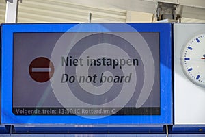 Sign at platform with \'Do not board\' or Niet Instappen in Dutch