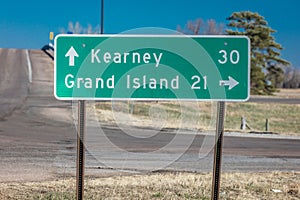 Sign pointing to Kearney and Grand Island Nebraska - midwestern America, along Interstate Highway 80