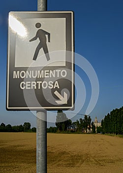 Sign pointing towards Certosa di Pavia monastery, built by Carthusians in 1396-1495. Renowned for the exuberance of its architectu