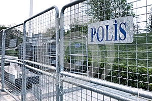 sign police in Turkish language on metallic borders barricades
