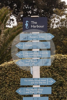 Sign post including destinations from the harbour on Herm Island, Channel Islands, UK