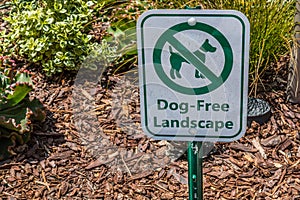 Sign Posted to Prohibit Access of Dogs on Landscaping