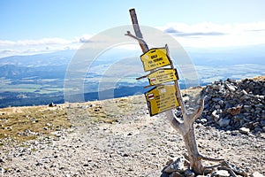 Sign posts on the top of the Ostrva mountain in High Tatras mountain, Slovakia