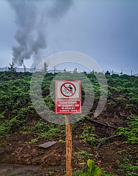 A sign prohibiting littering around the company. Indonesian Moluccas