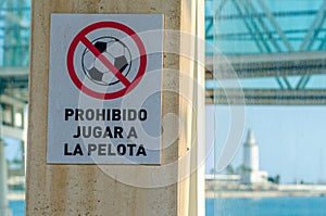 Sign that prohibits playing ball in Malaga, Spain photo