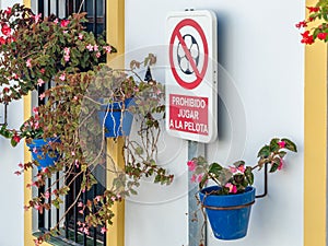 Sign that prohibits playing ball in a town in Spain